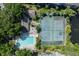 Aerial view of community pool, clubhouse, and tennis courts at 1109 Clubside Dr # 1109, Longwood, FL 32779