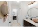 Bathroom featuring double sinks with white countertops and a connecting room featuring a separate vanity at 1109 Clubside Dr # 1109, Longwood, FL 32779