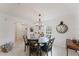 Dining room with a round table and comfortable seating, illuminated by a chandelier at 1109 Clubside Dr # 1109, Longwood, FL 32779