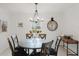 Cozy dining room featuring a round table and stylish decor, bathed in natural light at 1109 Clubside Dr # 1109, Longwood, FL 32779