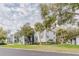 Well-maintained apartment complex exterior with lush landscaping and ample parking at 1109 Clubside Dr # 1109, Longwood, FL 32779