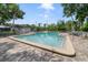 Community swimming pool with lounge chairs and manicured brick paver deck at 1109 Clubside Dr # 1109, Longwood, FL 32779