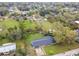Overhead view of the house displaying lush landscaping, mature trees, and quiet neighborhood at 1126 Turner Ln, Altamonte Springs, FL 32714
