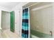 This bathroom features a green tub and tiled floor at 1126 Turner Ln, Altamonte Springs, FL 32714