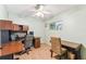 This bedroom has a ceiling fan and two desks at 1126 Turner Ln, Altamonte Springs, FL 32714
