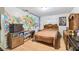 This bedroom features a mural on the wall and wood-look floors at 1126 Turner Ln, Altamonte Springs, FL 32714