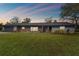 Charming single-story home with stone accents, well-manicured lawn, and attached two car garage at 1126 Turner Ln, Altamonte Springs, FL 32714