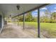 This covered patio shows steel support beams and an overhead ceiling fan at 1126 Turner Ln, Altamonte Springs, FL 32714