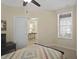 Bedroom with a carpet flooring, a ceiling fan, and an ensuite bathroom at 1205 Bella Rose Ct, Davenport, FL 33896