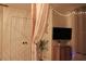 Cozy bedroom with soft lighting, and a decorative curtain feature at 13413 Hopkinton Ct, Windermere, FL 34786