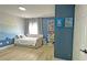Charming bedroom with a light beige bed and Sonic decor at 13413 Hopkinton Ct, Windermere, FL 34786