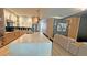 Modern kitchen with a large island, stainless appliances, and eat-in bar seating at 13413 Hopkinton Ct, Windermere, FL 34786