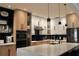 Modern kitchen with white countertops and stainless steel appliances at 13413 Hopkinton Ct, Windermere, FL 34786