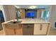 Modern kitchen with a large island, stainless appliances, and a farmhouse sink at 13413 Hopkinton Ct, Windermere, FL 34786