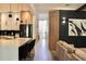 Modern kitchen with a large island, pendant lighting, and an open layout, ideal for entertaining at 13413 Hopkinton Ct, Windermere, FL 34786