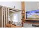 Stylish living room with a custom wooden entertainment center and electric fireplace at 13413 Hopkinton Ct, Windermere, FL 34786