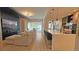 Open concept living area with a modern kitchen and inviting outdoor patio at 13413 Hopkinton Ct, Windermere, FL 34786