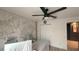 Stylish home office showcasing a world map accent wall and ample workspace at 13413 Hopkinton Ct, Windermere, FL 34786