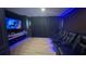 Home theater showcasing theater seats and large screen at 13413 Hopkinton Ct, Windermere, FL 34786