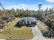 A beautiful single Gathering home with dark shutters and a long interlocking brick driveway at 15163 Sw 29Th Terrace Rd, Ocala, FL 34473