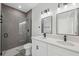 Modern bathroom with dual sinks and a walk-in shower at 15163 Sw 29Th Terrace Rd, Ocala, FL 34473