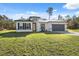 Charming single-Gathering home boasts a well-manicured lawn and attached two car garage at 15163 Sw 29Th Terrace Rd, Ocala, FL 34473