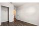 Bedroom featuring a closet with open door and wood-look flooring at 2171 Longleaf Rd, Davenport, FL 33837