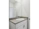 Bathroom featuring a modern vanity with sleek fixtures and a large mirror at 2513 Merseyside Ct, Haines City, FL 33844