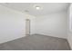 Bright bedroom with neutral carpet, a ceiling light, and a window at 2513 Merseyside Ct, Haines City, FL 33844