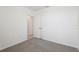 Bedroom featuring a doorway with carpet floors and white walls at 2513 Merseyside Ct, Haines City, FL 33844