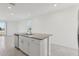 Open concept kitchen with a view of an open living area at 2513 Merseyside Ct, Haines City, FL 33844