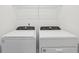 Laundry room featuring a side by side washer and dryer for convenient laundry at 2513 Merseyside Ct, Haines City, FL 33844