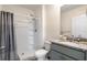 Bathroom features a granite vanity and walk-in shower at 2634 Angel Falls Dr, Davenport, FL 33837