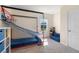 bedroom featuring unique bunk bed with basketball net and play area at 2634 Angel Falls Dr, Davenport, FL 33837