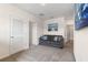 Upstairs sitting room features comfortable couch and a quiet retreat at 2634 Angel Falls Dr, Davenport, FL 33837
