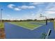 View of community basketball courts with blue and green painted surface at 2688 Gouda Dr, Apopka, FL 32703
