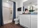 Bright bathroom featuring a walk-in shower and white vanity at 2688 Gouda Dr, Apopka, FL 32703