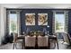 Elegant dining room with stylish furnishings, designer accents, and large windows at 2688 Gouda Dr, Apopka, FL 32703