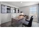 Contemporary office space showcasing minimalist design and a window view of the community at 2688 Gouda Dr, Apopka, FL 32703