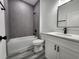 Bathroom featuring gray tiling in the shower and a white sink vanity at 2693 Sw 153Rd Place Rd, Ocala, FL 34473
