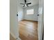 Bedroom boasts bright natural light and updated wood-look floors at 2818 Geoffrey Dr, Orlando, FL 32826
