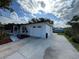Charming single-story home featuring a screened in porch and an attached one car garage at 2818 Geoffrey Dr, Orlando, FL 32826