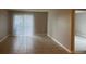 Living room with tile flooring and sliding glass doors at 314 Cherokee Ct # A, Altamonte Springs, FL 32701