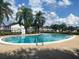 Community pool featuring clear blue water and well kept grounds at 314 Cherokee Ct # A, Altamonte Springs, FL 32701