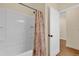 Bathroom with a shower-tub combination, and a decorative shower curtain at 3771 Whitetail Ct, St Cloud, FL 34772