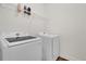 Neat laundry room with a modern Samsung washer and dryer at 3771 Whitetail Ct, St Cloud, FL 34772