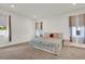 Spacious main bedroom with carpet, a large bed, and neutral colored walls at 3771 Whitetail Ct, St Cloud, FL 34772