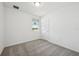 Bedroom featuring a window at 4002 Copperleaf Ln, Poinciana, FL 34759