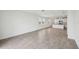 Bright open concept area featuring a large kitchen with tile flooring and lots of natural light at 4002 Copperleaf Ln, Poinciana, FL 34759