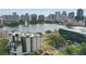 Gorgeous aerial view capturing prime real estate featuring city skyline, community features, and lush landscaping at 401 E Robinson St # 101, Orlando, FL 32801